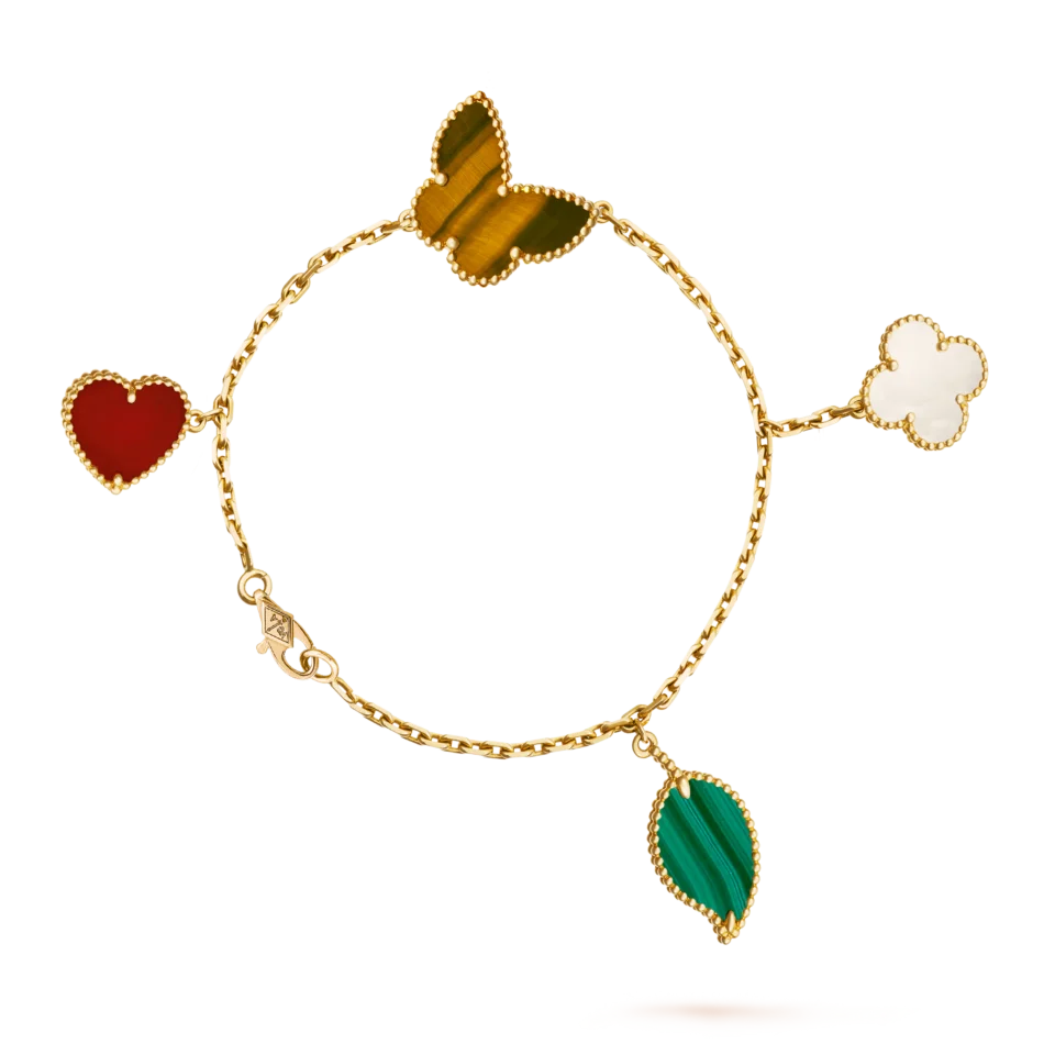 Van Cleef&Arpels Lucky Alhambra bracelet, featuring 4 themed patterns of golden turquoise, mother of pearl, ruby, and tiger's eye