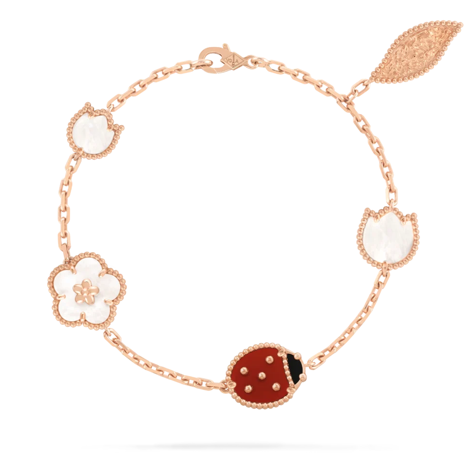 Van Cleef&Arpels Lucky Spring bracelet, featuring 5 themed patterns of rose gold, mother of pearl, ruby, and onyx