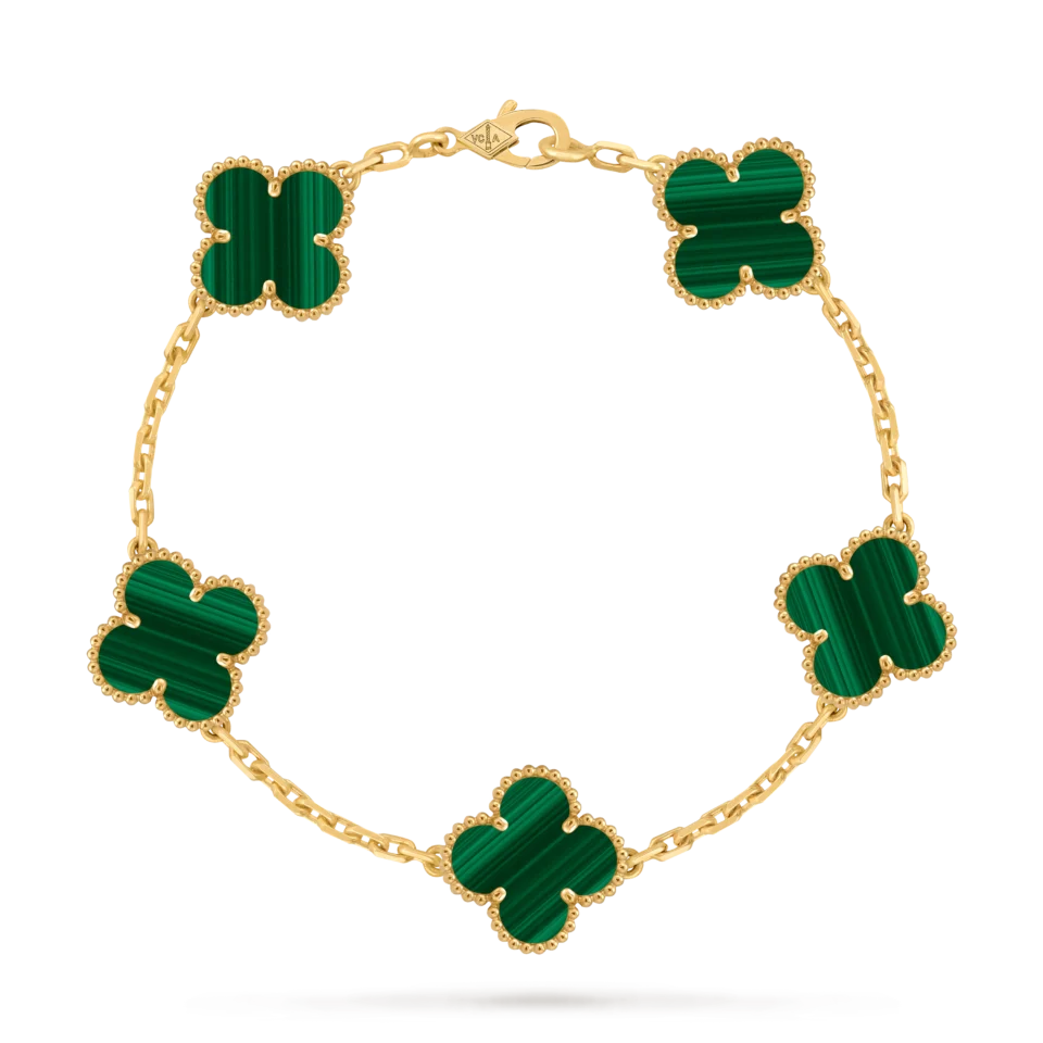 Van Cleef & Arpels  Vintage Alhambra bracelet with 5 lucky four leaf patterns and golden peacock stones